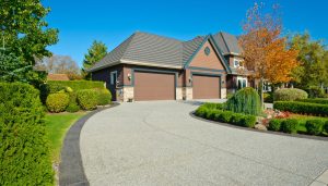 Paved Concrete Driveways Medford, OR Improve Appearance Durable and Smooth Vehicle Surfaces with Many Customizable Options Increase Property Value and Convenience